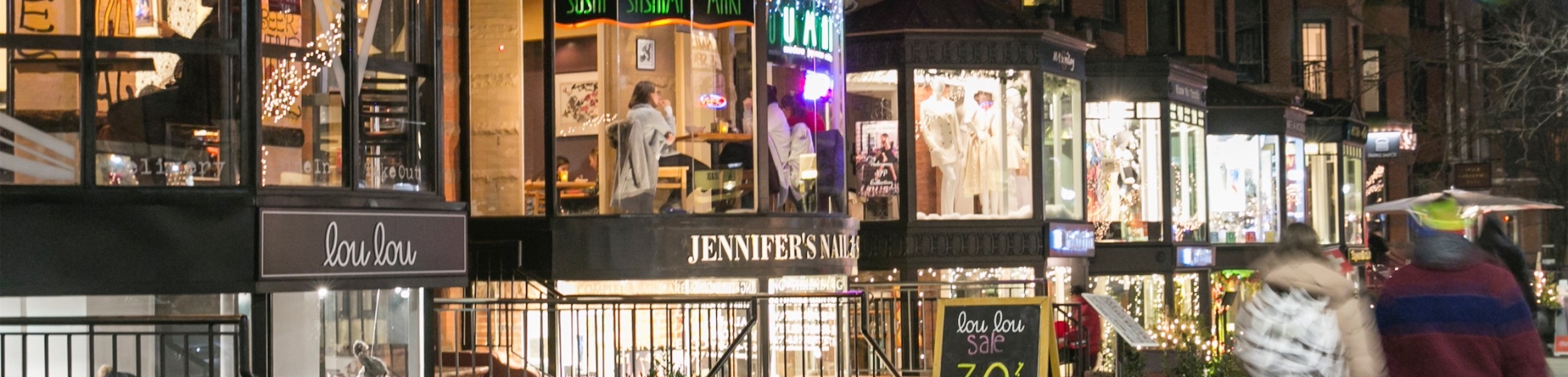 people walking down newbury street