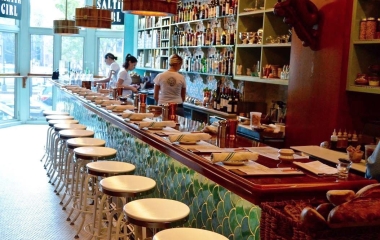 people working behind the bar at saltie girl