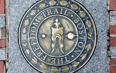the freedom trail emblem on the ground