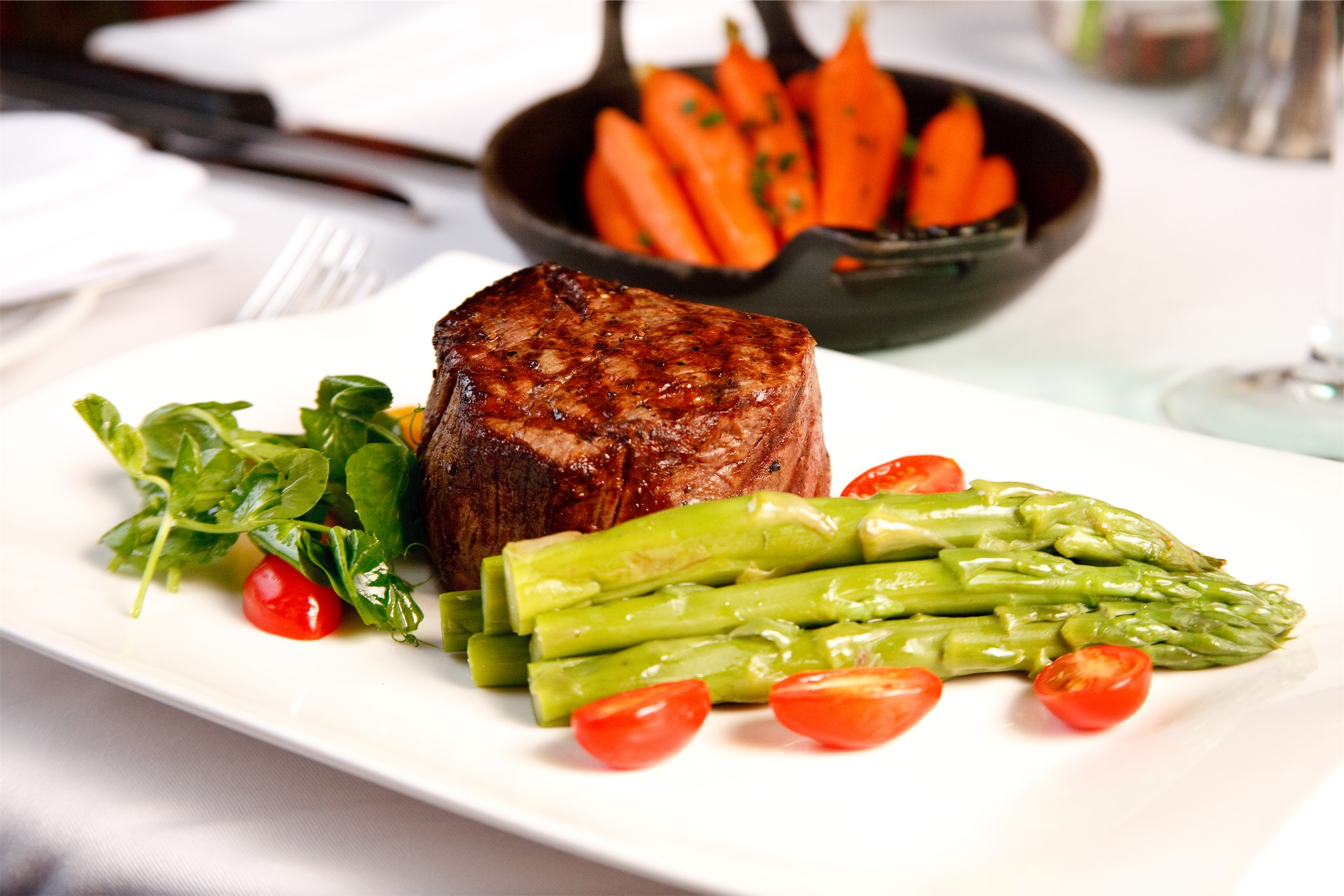 beef and asparagus on a plate