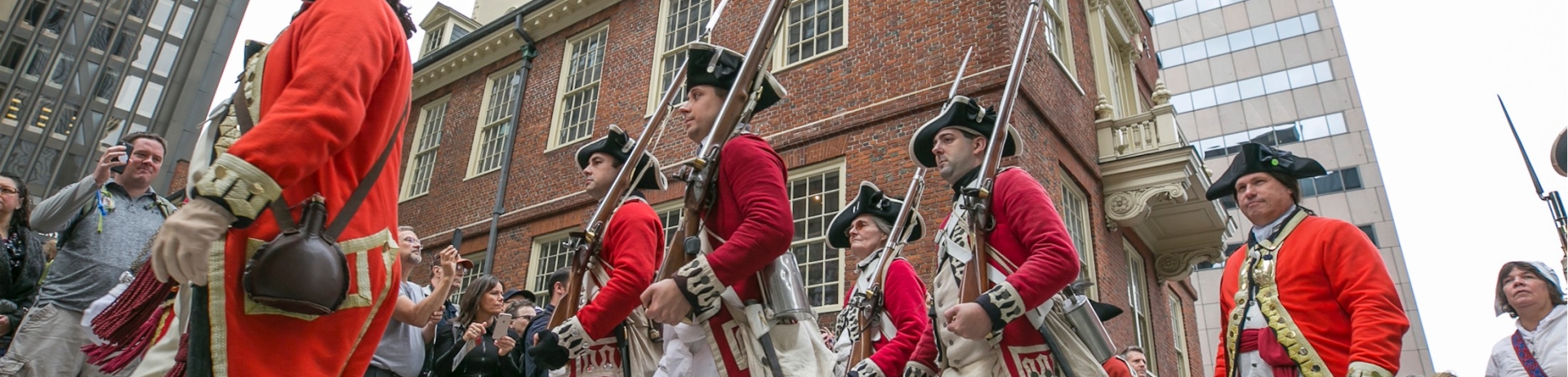 men in regalia marching