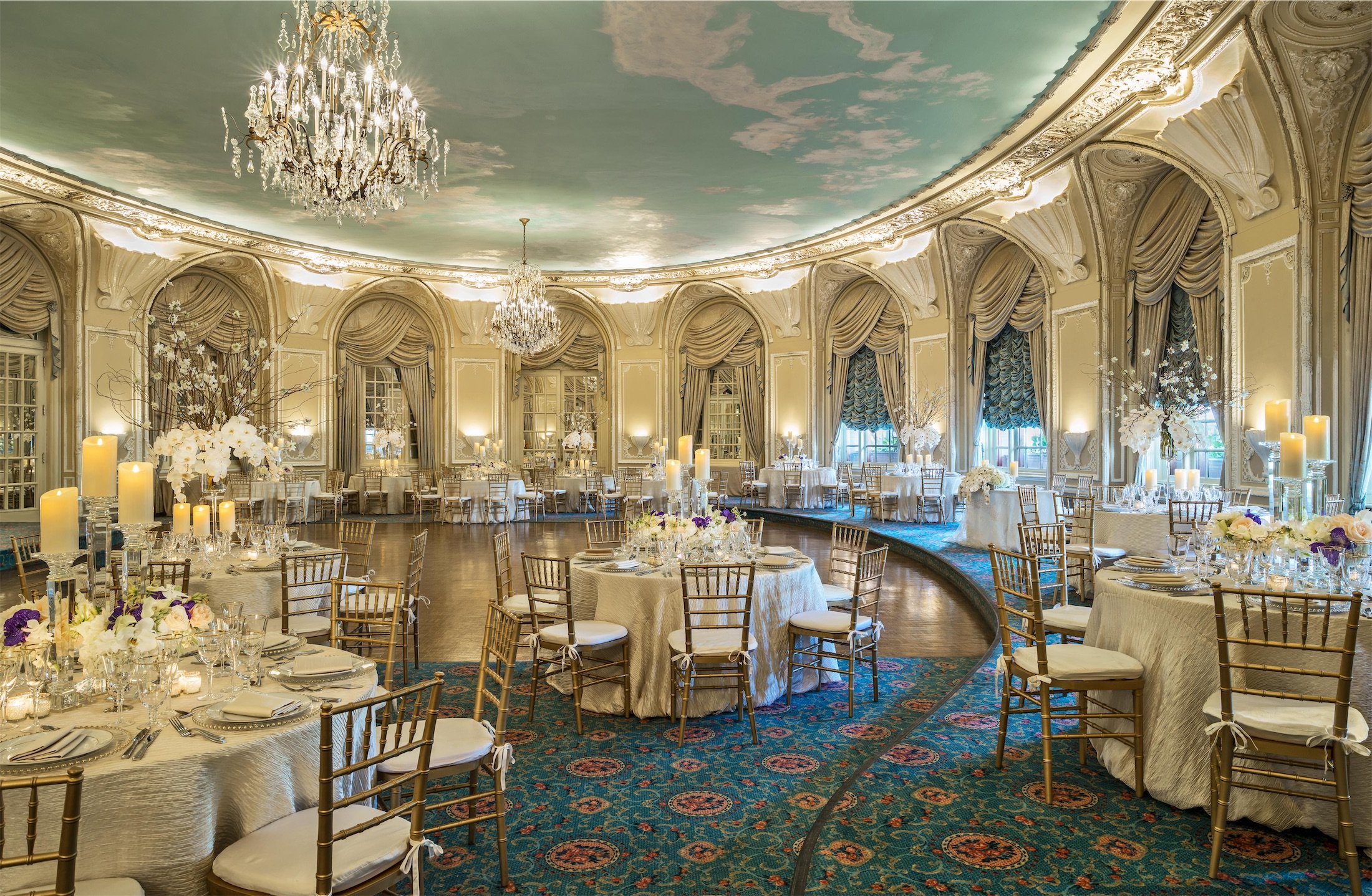 large oval shaped room set up for a wedding
