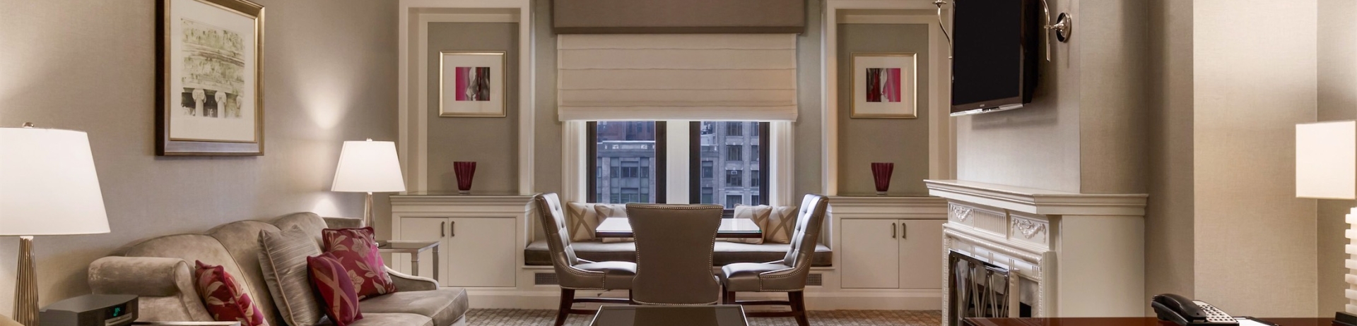 living room with fireplace and window nook