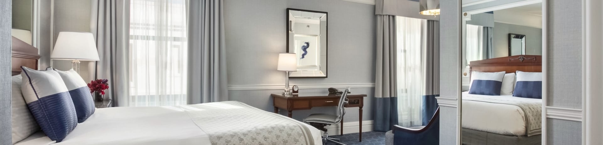 bedroom with desk and siting area