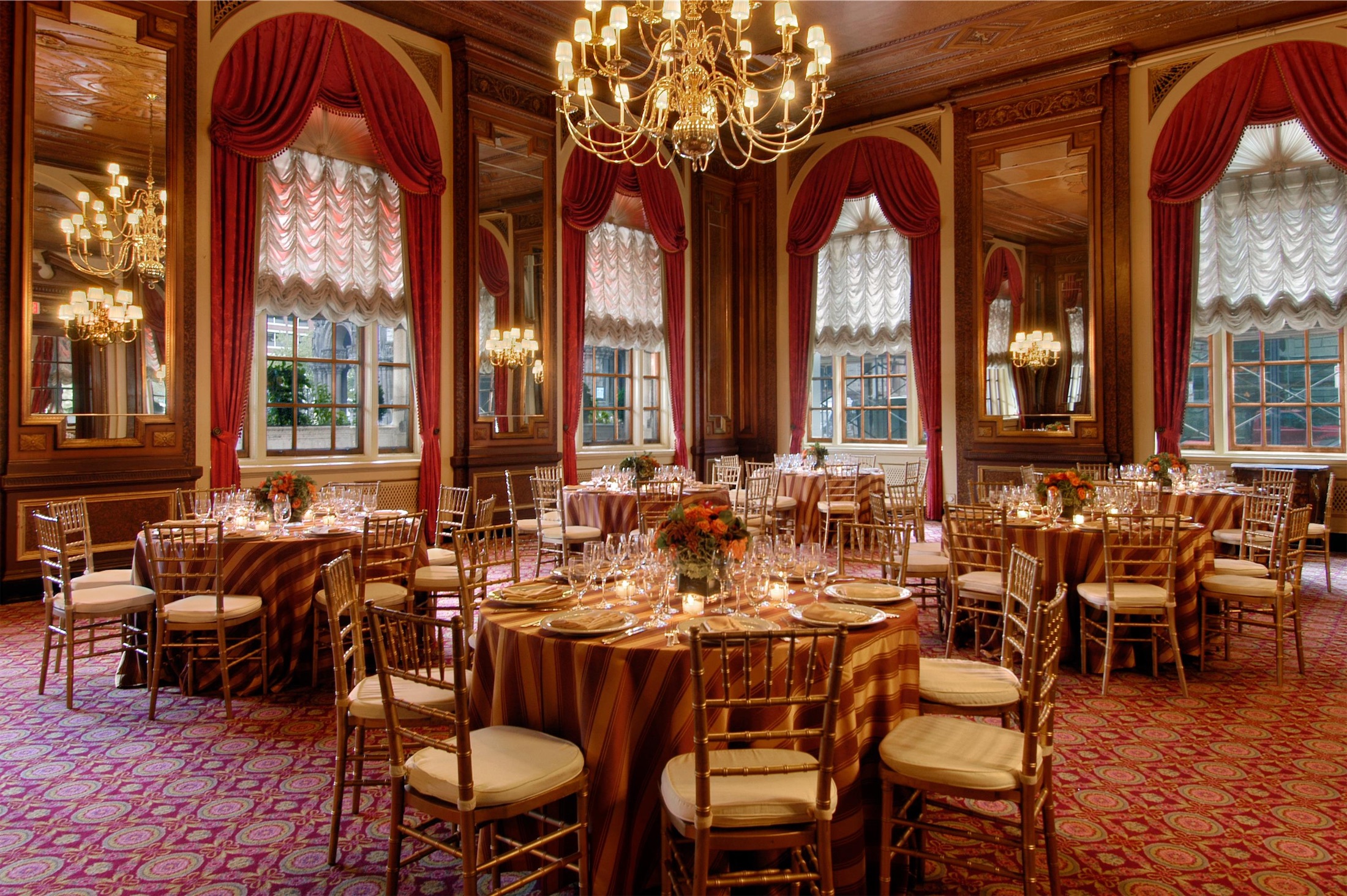 red room set up for a wedding reception