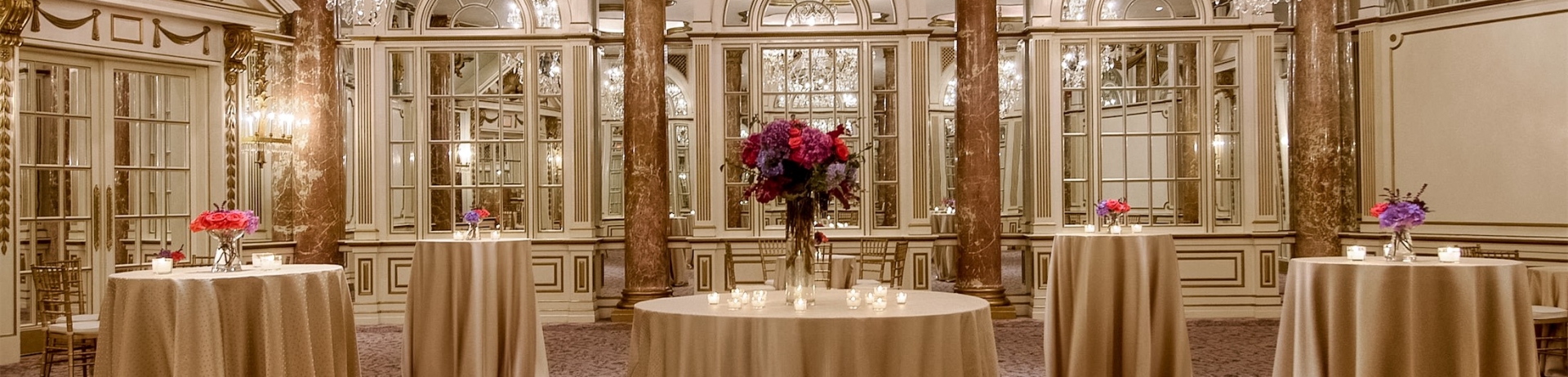 meeting room set up with tall round tables